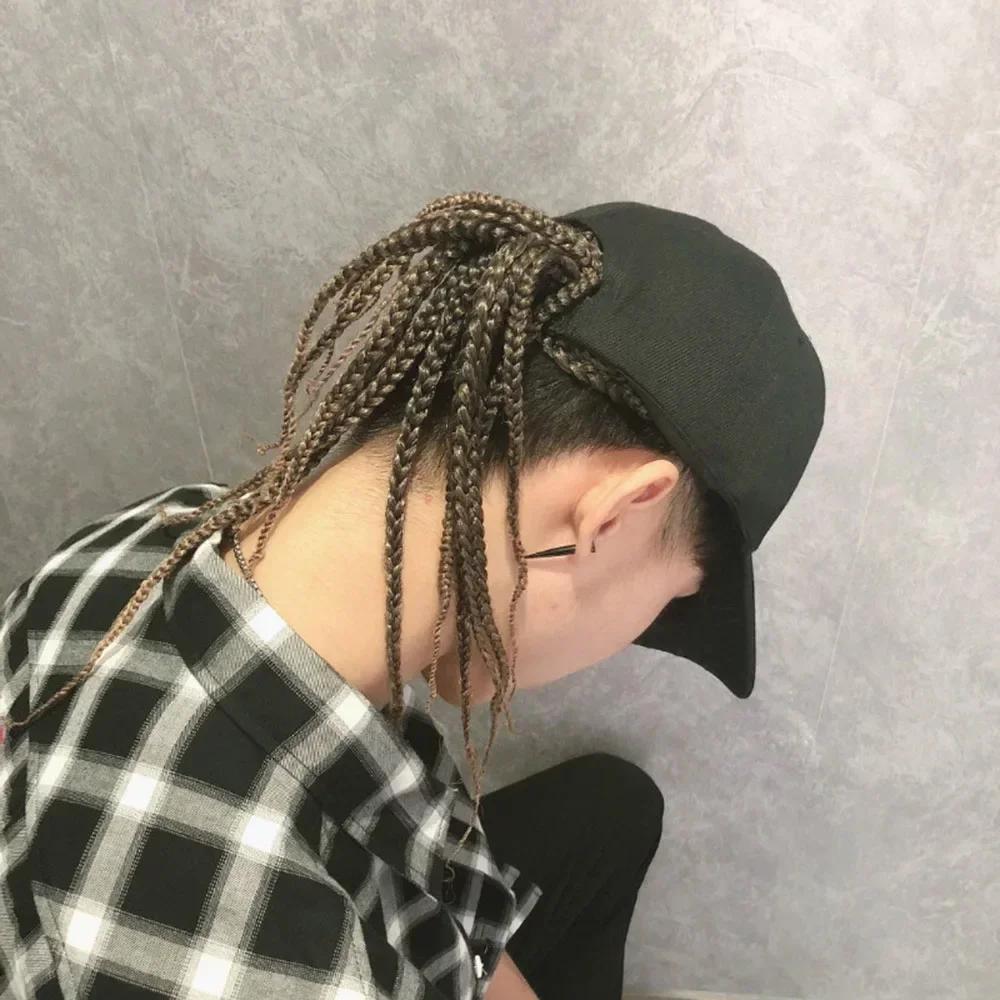 Flätad perukkeps – Snapback-keps med fastsydda dreadlockflätor